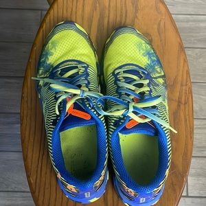 ASICS 11.5 mens used.